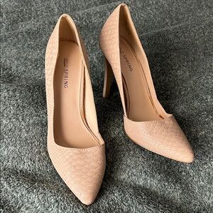 Beige and gold pumps